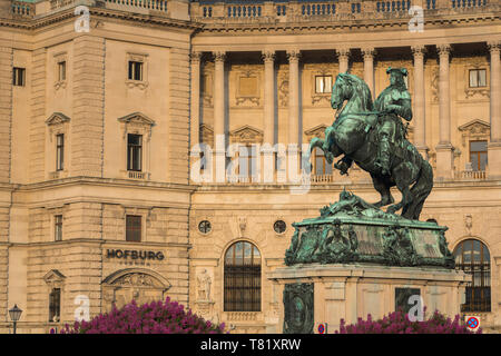 Vienna iconic, view of the statue of Prince Eugene of Savoy against the backdrop of the Neue Burg building in the Hofburg Palace complex, Wien Austria Stock Photo