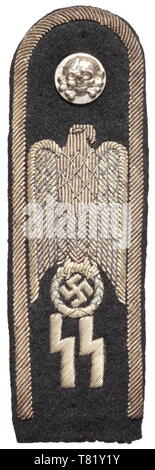 A trial shoulder board for a designed formal dress uniform for SS leaders of fine black cloth with silver-embroidered edging and national eagle above SS runes, black wool liner. One-piece stamped silver button with a death's head in relief. Slightly darkened. Included is a copy of an invoice from 1971. Presumably a unique trial piece. historic, historical, 20th century, troop, troops, SS, Schutzstaffel, Editorial-Use-Only Stock Photo