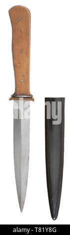 A combat fighting knife. Polished blade without manufacturer's trademark. Steel hilt with wood grip plates retained by three rivets. Black lacquered steel scabbard with belt/boot clip. Length 27 cm. USA-lot historic, historical, army, armies, armed forces, military, militaria, 20th century, Editorial-Use-Only Stock Photo