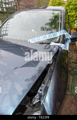 Volkswagen Golf. Car crash damage and details. Head on vehicle accident. Police tape and Car crash background. Stock Photo