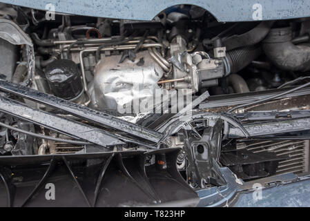 Volkswagen Golf. Car crash damage and details. Head on vehicle accident. Police tape and Car crash background. Stock Photo