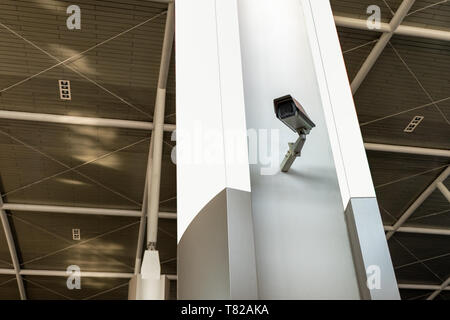 CCTV surveillance camera with blank billboard on pole Stock Photo