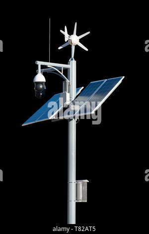 CCTV security camera with solar cell panel of clean energy electric pole. isolated on background Stock Photo
