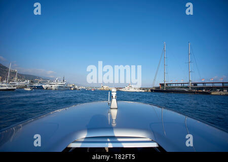 Close up of the side of a modern luxury speed boat having fun racing in the waters of the Riveira in Monaco Stock Photo