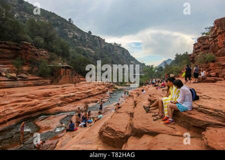 United States, Arizona, Sedona in Slide Rock State Park located on Oak Creek Canyon, Swimmers, Red Rocks Stock Photo