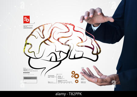 Man showing human brain structure Stock Photo