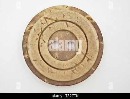 One brown round button isolated on white background. Stock Photo