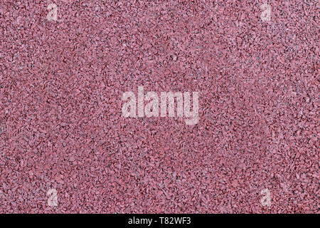 red background with spotlight. Asphalt texture background. Stock Photo