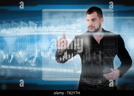 Businessman works with virtual holographic interface. Future technology concept Stock Photo