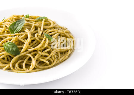 Spaghetti pasta with pesto sauce isolated on white background Stock Photo