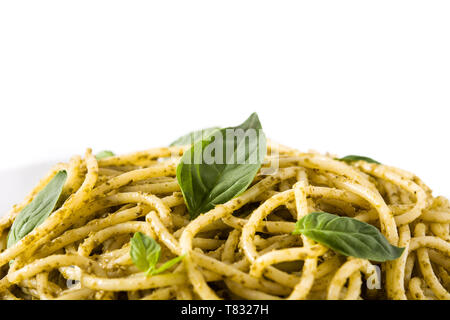 Spaghetti pasta with pesto sauce isolated on white background Stock Photo
