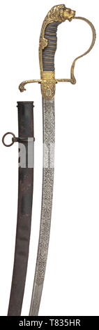 A Damascus presentation gift sabre for officers Pipe-back Damascus blade with yelmen, etched on both sides, the base of the blade with maker's mark 'WK & C' surmounted by a king's head and knight, on the obverse between scrolling leaves the inscription 'J. W. Colsman TB8! s/L. R. Bäuerle TB8! 1910'. Relief brass knuckle-bow hilt (traces of gilding) with lion head pommel (red glass eyes) and artillery symbol, ray skin grip with triple brass wire binding. Comes with black lacquered sheet steel scabbard (dented, rusty), one movable suspension ring. , Additional-Rights-Clearance-Info-Not-Available Stock Photo