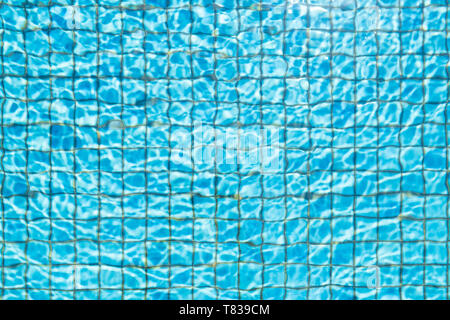 Blue ceramic tile mosaic in swimming pool - seamless texture Stock Photo