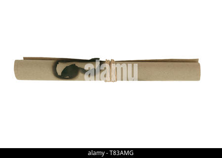Twisted burned beige scroll paper and tied up with beige rope. Isolated on white background Stock Photo