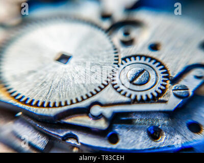 Two gears of a cheap mechanical movement Stock Photo