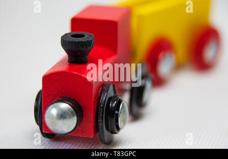 red toy train with cart Stock Photo