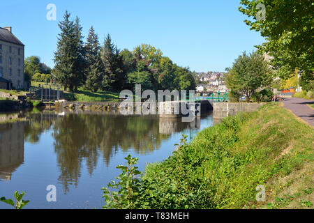 River Oust, part of canal Nantes at Brest, and sluice at Josselin, a commune in the Morbihan department in Brittany in north-western France Stock Photo