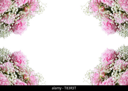 Flower composition. Frame of pink flowering bouquets of Peonies and Baby's Breath flowers over a white background  with free space for your text. Stock Photo