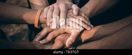 Teamwork Join Hands Support Together Concept. Sports People Joining Hands. Stock Photo