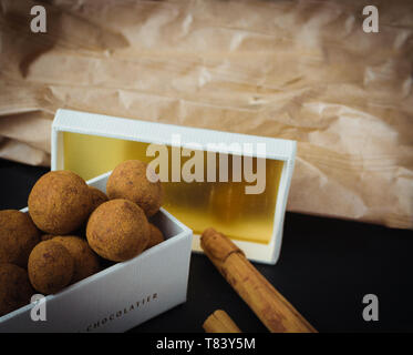 cinnamon chocolate balls. Temptation food. A delicious gift for bonbons lovers Stock Photo