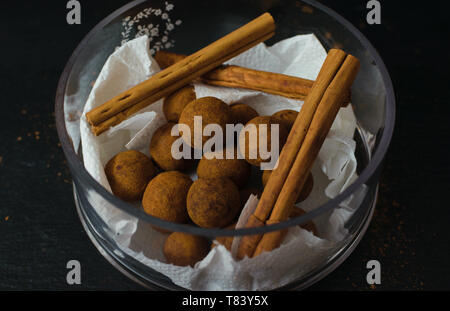 cinnamon chocolate balls. Temptation food. Delicious gift for bonbons lovers Stock Photo