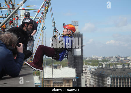 Frank Clark, an 89-year-old great-grandfather, prepares to abseil from the top of St Thomas' Hospital in London as part of a fundraising event for Evelina London Children's Hospital. Clark, from Southwark in south London, took on the challenge to raise money for Guy's and St Thomas', having been treated at both hospitals throughout his life. Stock Photo