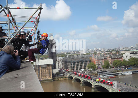 Frank Clark, an 89-year-old great-grandfather, prepares to abseil from the top of St Thomas' Hospital in London as part of a fundraising event for Evelina London Children's Hospital. Clark, from Southwark in south London, took on the challenge to raise money for Guy's and St Thomas', having been treated at both hospitals throughout his life. Stock Photo