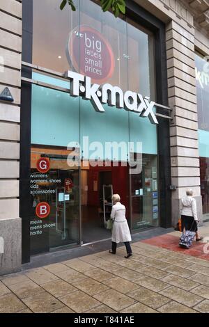 LEEDS, UK - JULY 11, 2016: People enter TK Maxx store in Leeds, UK. As of 2014 the clothing outlet and home goods company had some 1000 stores worldwi Stock Photo