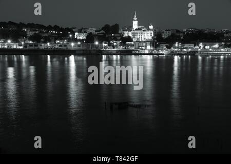 Belgrade, Serbia - capital city view at night. Illuminated cityscape. Black and white tone - retro monochrome color style. Stock Photo