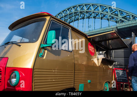 Newcastle, United Kingdom - February 23, 2019: A renovated classic van is used as a portable canteen serving pizza at Gateshead, Newcastle with Tyne Stock Photo