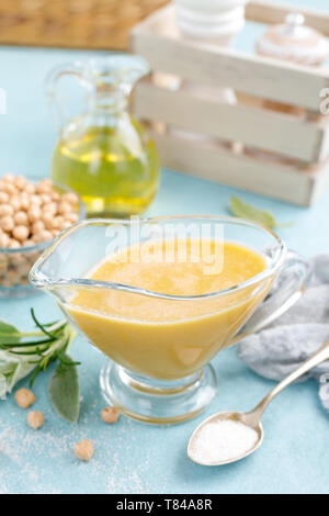 Chickpea sauce, hummus with ingredients for cooking Stock Photo