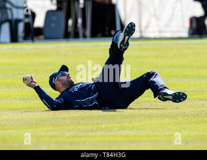 The Grange, Edinburgh, Midlothian, UK. 10th May 2019. Scotland v Afghanistan ODI. Pic shows: A brilliant catch by Scotland captain, Kyle Coetzer, to dismiss Afghanistan's Hazratullah Zazai, for 14 during the second innings as Scotland take on Afghanistan in a One Day International at the Grange, Edinburgh Credit: Ian Jacobs/Alamy Live News Stock Photo