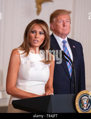 United States President Donald J. Trump and First lady Melania Trump participate in the Celebration of Military Mothers in the East Room of the White House in Washington, DC on May 10, 2019. Credit: Ron Sachs/CNP/MediaPunch Stock Photo