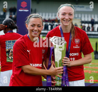 Boreham Wood, UK. 11th May, 2019. BOREHAMWOOD, United Kingdom - May 11: L-R Katie McCabe of Arsenal and Louise Quinn of Arsenal  with Trophy during Women's Super League match between Arsenal and Manchester City Women FC at Meadow Park Stadium , Boredom Wood on 11 May 2019 in Borehamwood, England  Credit Action Foto Sport Stock Photo