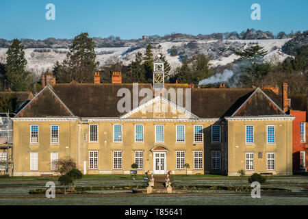 Reigate, UK - January 30, 2019 - view of Priory Park Junior School; snow covered North Downs hills; winter in the UK Stock Photo