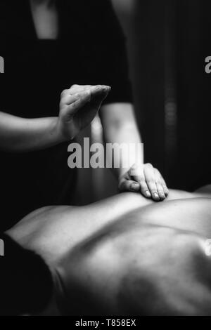 Relax Lower Back Massage Stock Photo by microgen