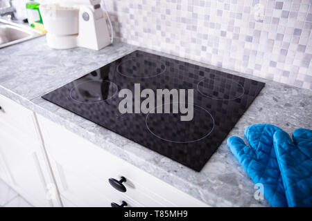 View Of A Induction Stove In Modern Kitchen Stock Photo