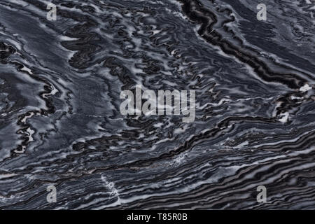 Extraordinary hard natural quartzite texture with unusual surface in stylish black and white colors. Stock Photo