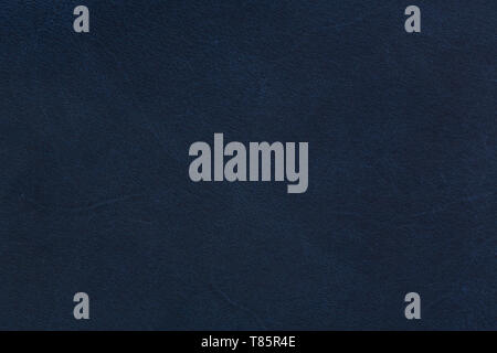 Dark blue leather texture on macro. Blue leather background. Stock Photo
