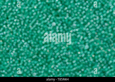 Abstract background of green blured holiday lights. Stock Photo