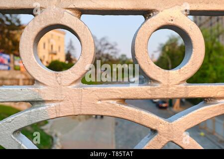 Kyiv UA, 23-04-2019. Abstract metallic gray figured fence on the bridge in Kyiv on square Maidan Nezalezhnosti. Stock Photo