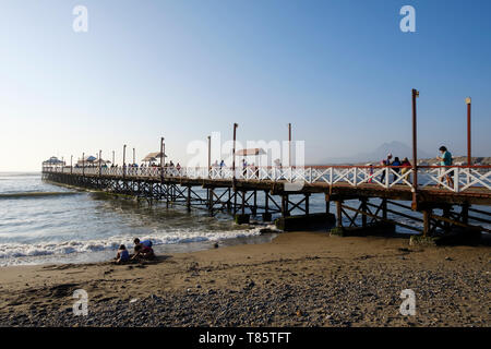 Huanchaco Pier at sunset in the city of Trujillo, Peru Stock Photo