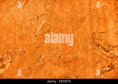 Close up of abstract turmeric orange toned granite stone texture with high resolution. For background, textures, product designs, albums, cards and in Stock Photo