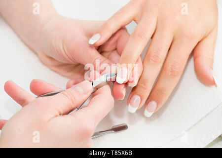 Woman having manicure Stock Photo