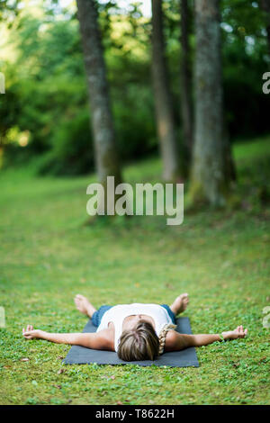 Yoga corpse pose Stock Photo