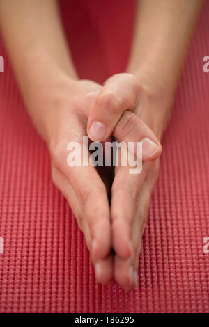 Woman doing yoga Stock Photo