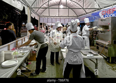 Chefs in the kitchen preparing food for the annual food festival at Pattaya Thailand Southeast Asia Stock Photo