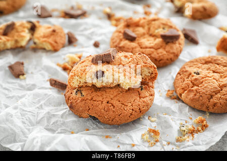 Delicious cookies on parchment paper
