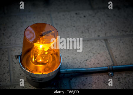 Emergency orange alert light closeup object detail concept warning  Stock Photo