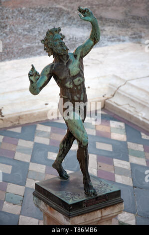 Pompeii, the best preserved archaeological site in the world, Italy. The statue of the dancing Faun of Pompeii Stock Photo